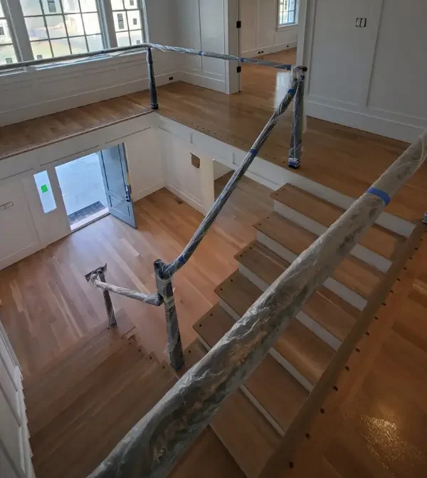 Hardwood floor installation service with stair nosing detail