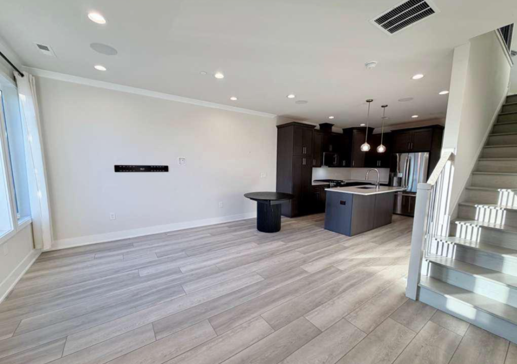 Light grey luxury vinyl plank flooring installed