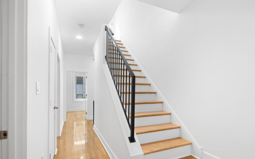 newly installed honey-toned hardwood floors